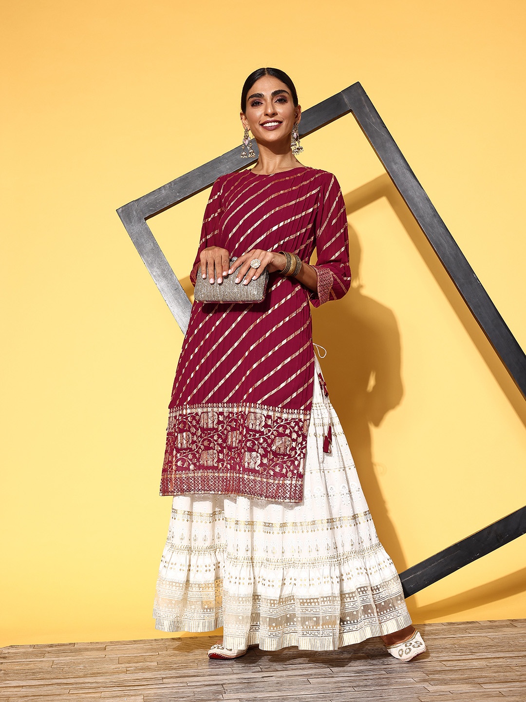 

Tikhi Imli Women Charming Maroon Georgette Vacation Stripes Kurta