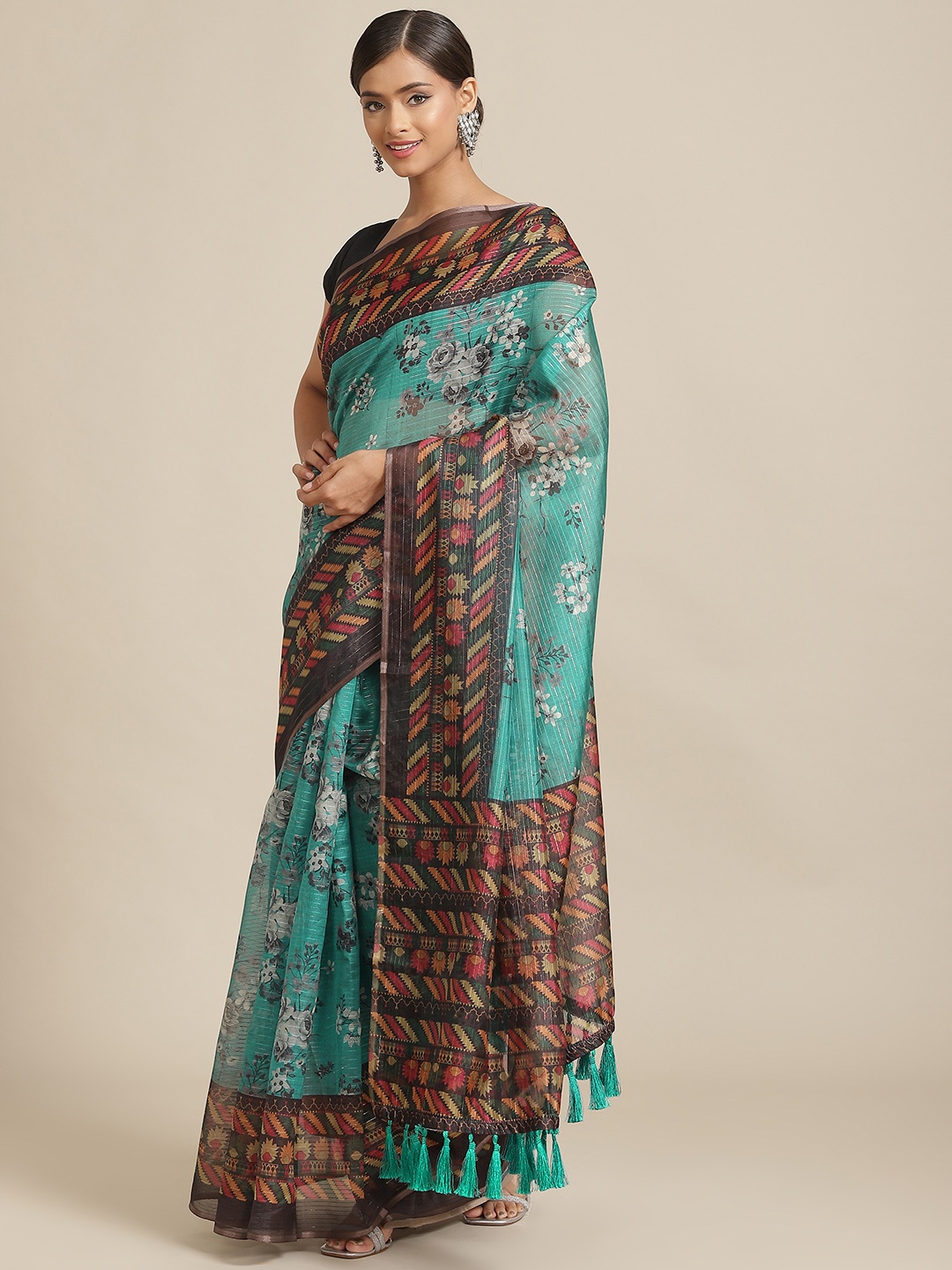 

Silk Land Teal & Black Floral Zari Silk Blend Saree