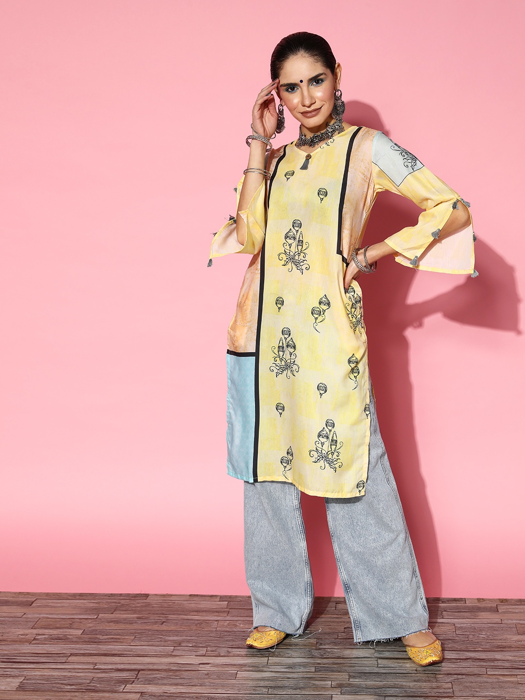 

Tikhi Imli Women Yellow Quirky Printed Flared Sleeves Kurta