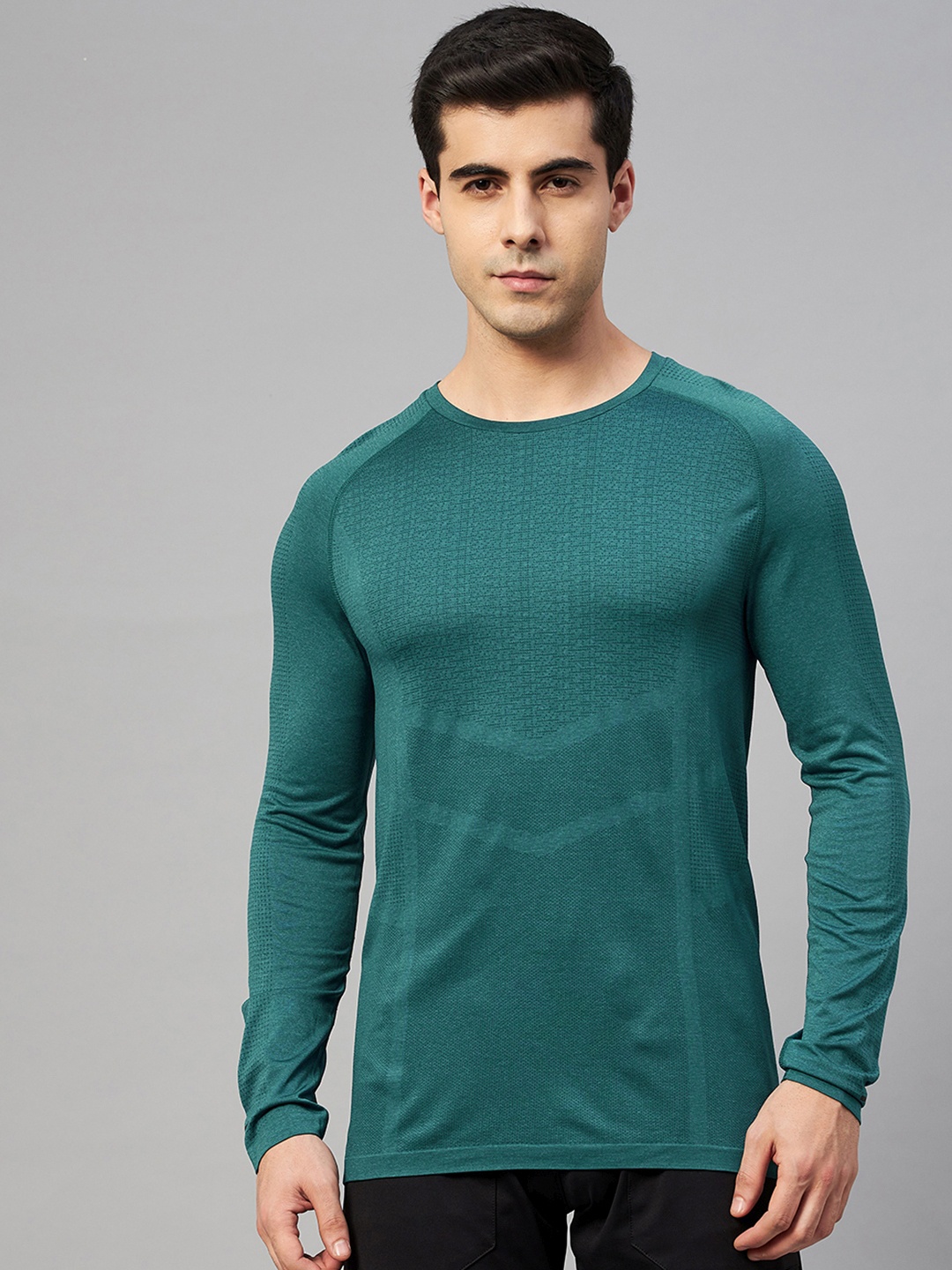 

Marks & Spencer Men Teal Green Self Design Raglan Sleeves Quick-Dry T-shirt