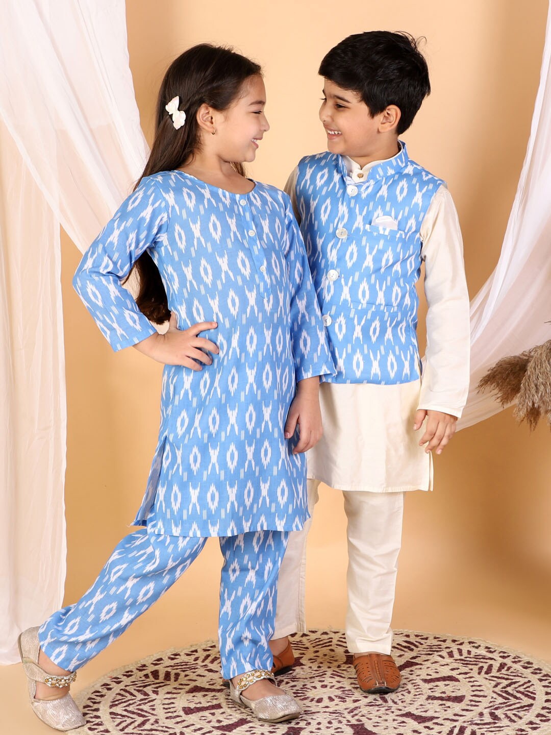 

VASTRAMAY Boys Cream-Coloured Printed Kurta with Pyjama With Ikat Printed Nehru Jacket