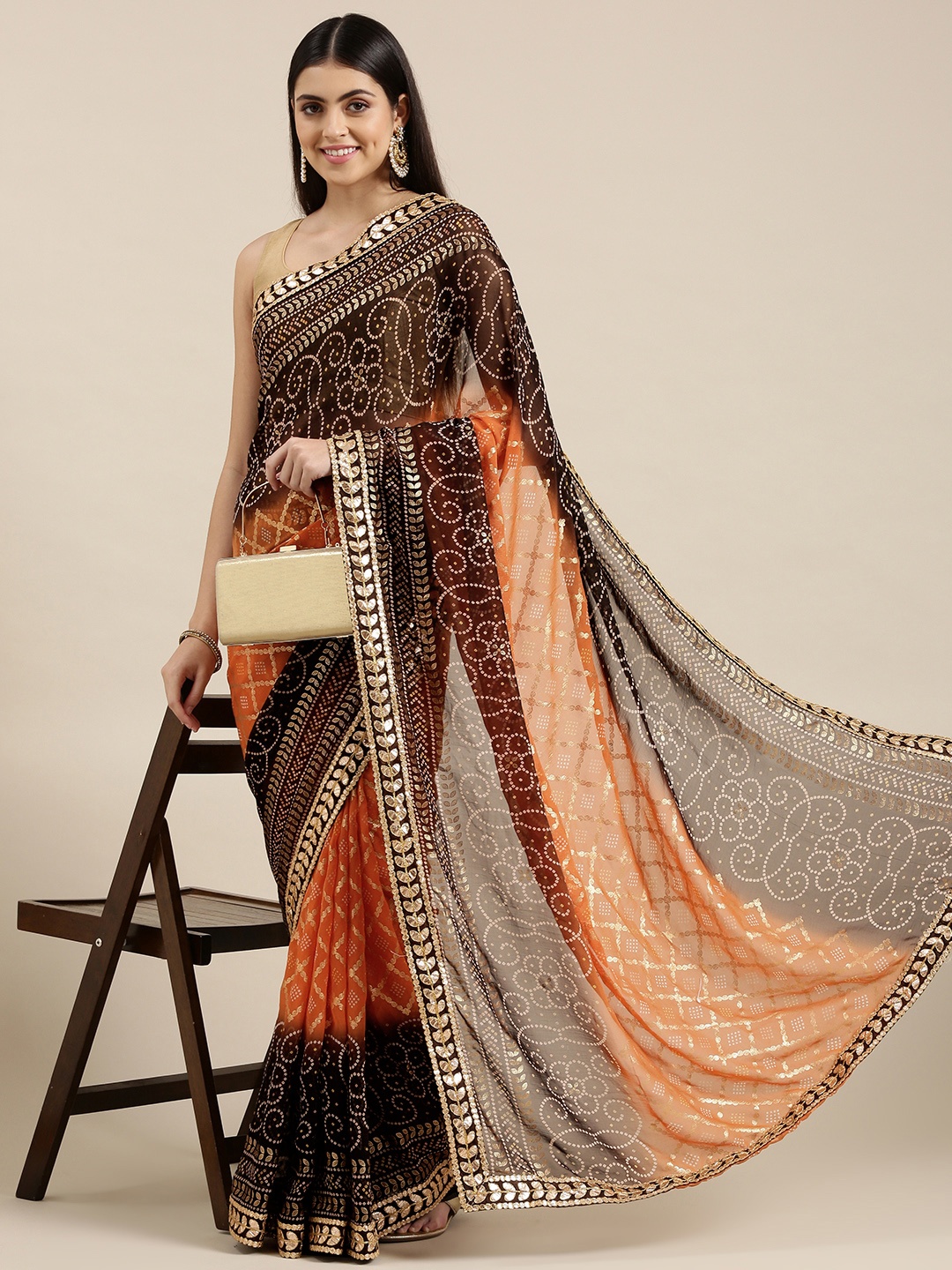 

Mitera Brown & Orange Bandhani Gotta Patti Pure Georgette Bandhani Saree