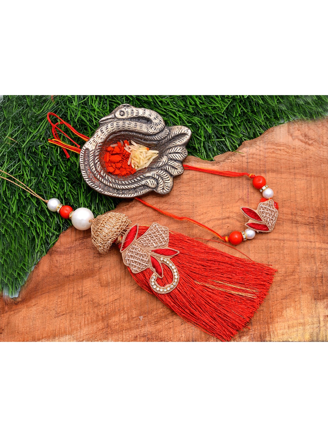 

Silvermerc Designs Red & Gold Thread Rakhi & Lumba Set