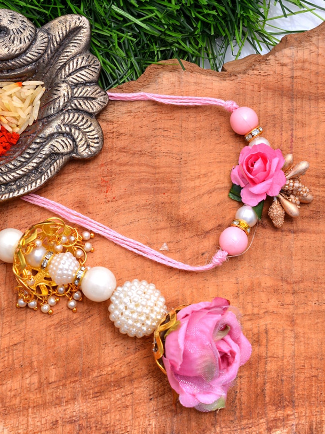 

Silvermerc Designs Pink Floral Bhaiya Bhabhi Rakhi Set