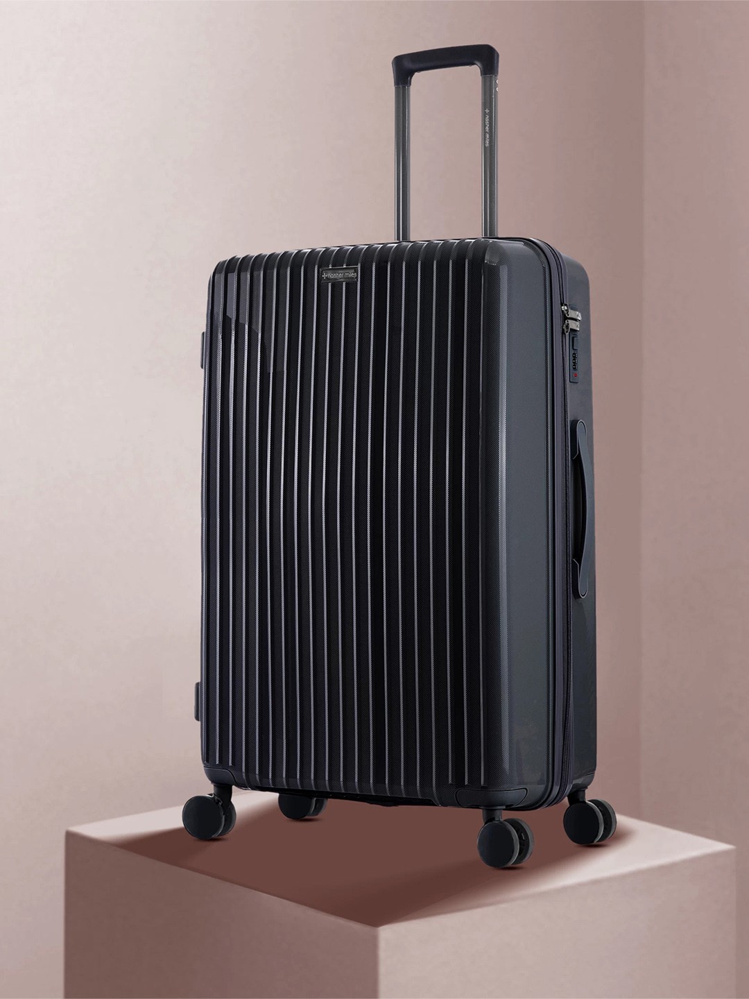 

Nasher Miles Auroville Textured Hard Large Trolley Bag - 75 cm, Black