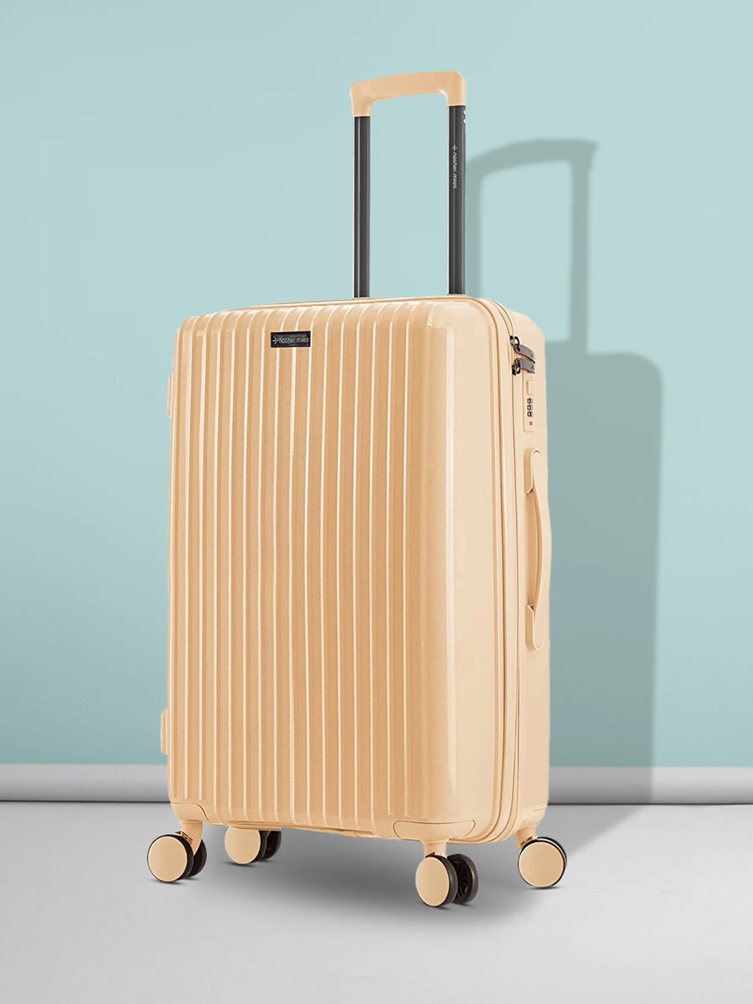 

Nasher Miles Auroville Textured Hard Medium Trolley Suitcase - 65 cm, Peach
