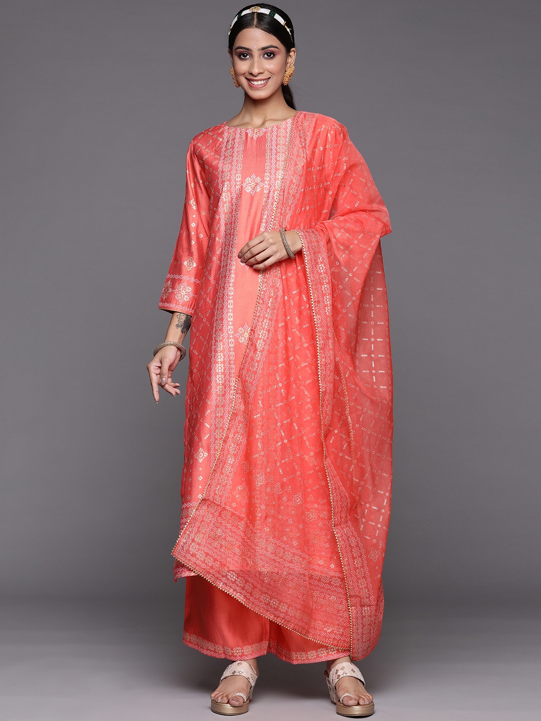 

Indo Era Women Orange Ethnic Motifs Printed Liva Kurta with Trousers & With Dupatta