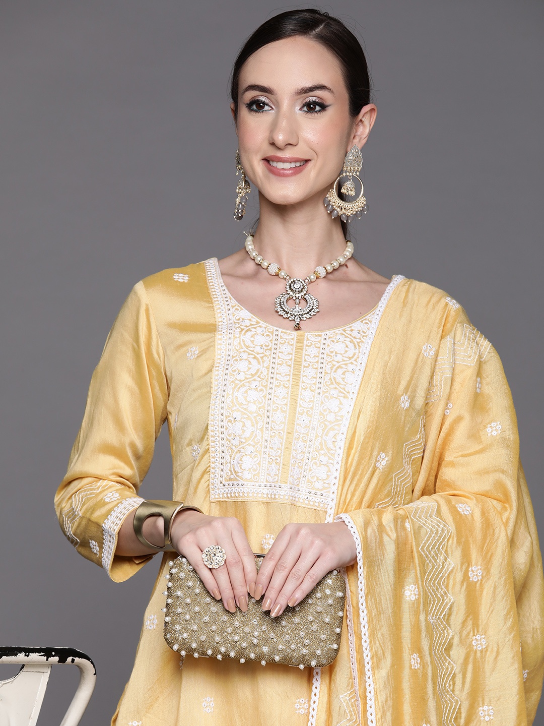 

Indo Era Women Yellow Floral Embroidered Chanderi Silk Kurta with Trousers & Dupatta