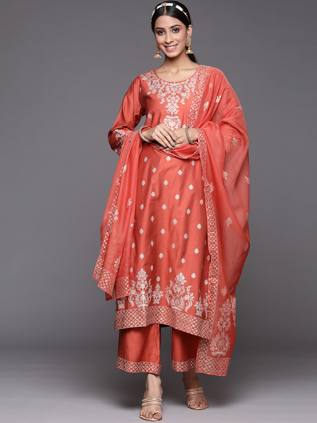 

Indo Era Women Rust Orange Ethnic Motifs Printed Liva Kurta with Palazzos & Dupatta