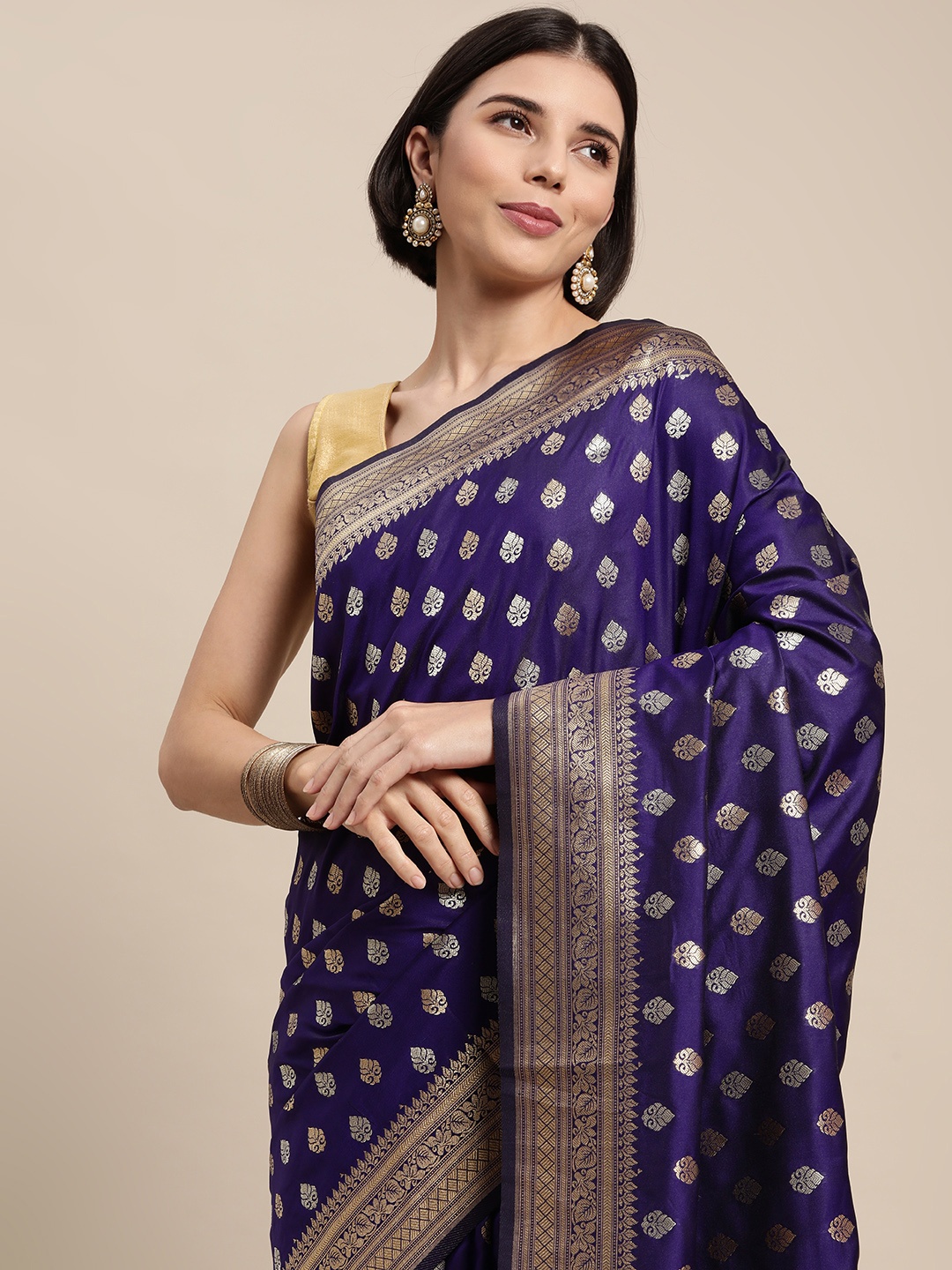 

Mitera Blue & Gold-Toned Ethnic Motifs Zari Silk Blend Banarasi Saree