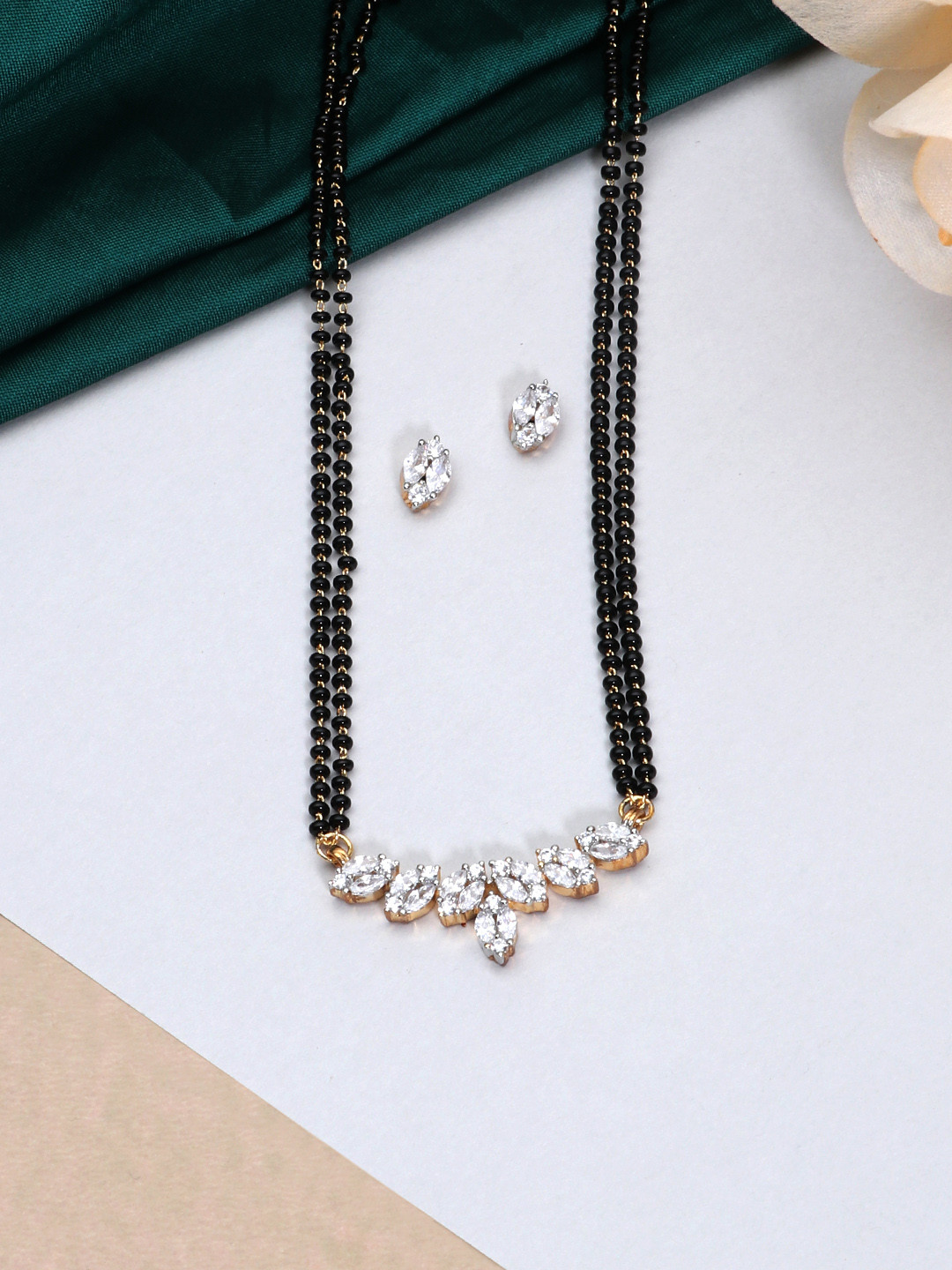 

LAIDA Gold-Plated White AD-Studded Pendant & Beaded Mangalsutra With Earrings