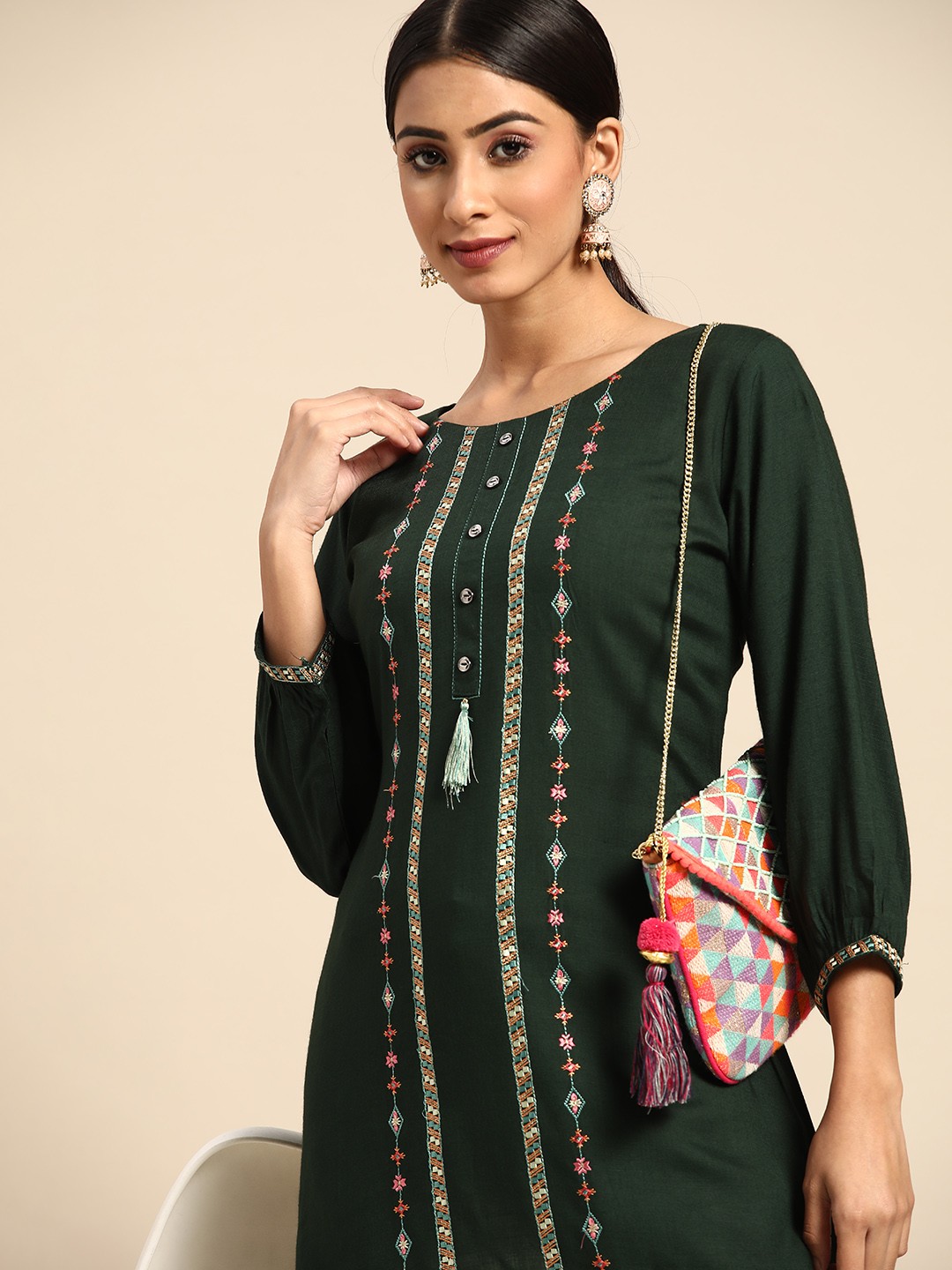 

Sangria Green Ethnic Motifs Embroidered Top