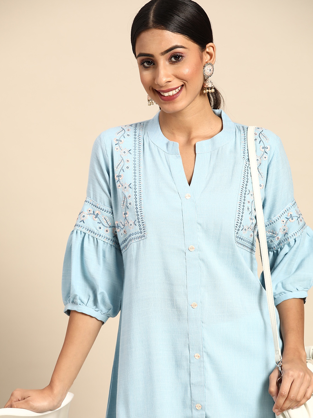 

Sangria Blue Embroidered Detail A-Line Top