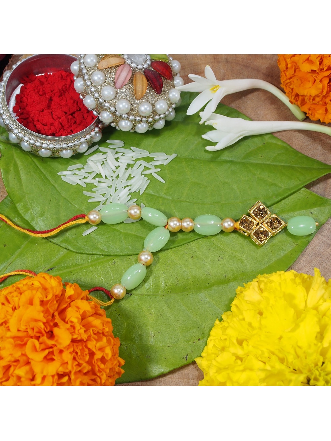 

I Jewels Green & Gold-toned Set 2 Pearl Studded and Beaded Lumba Rakhi with Greetings Card