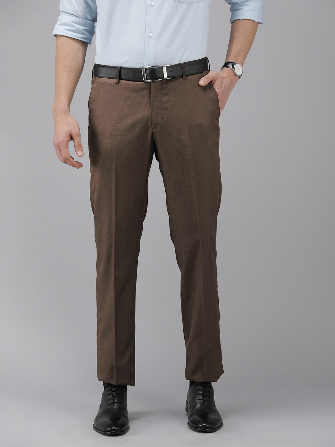 

Arrow Men Dark Brown Solid Mid-Rise Tailored Fit Formal Trousers