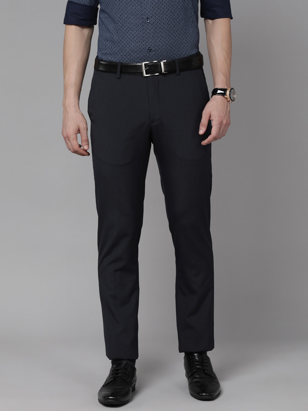 

Arrow Men Navy Blue Solid Mid Rise Tailored Trousers
