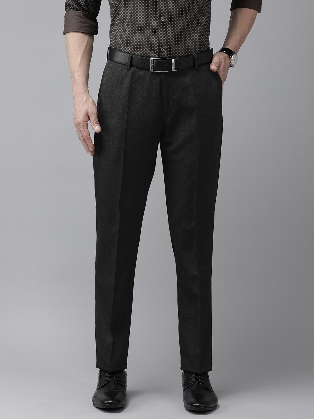 

Arrow Men Black Solid Tailored Fit Formal Trousers