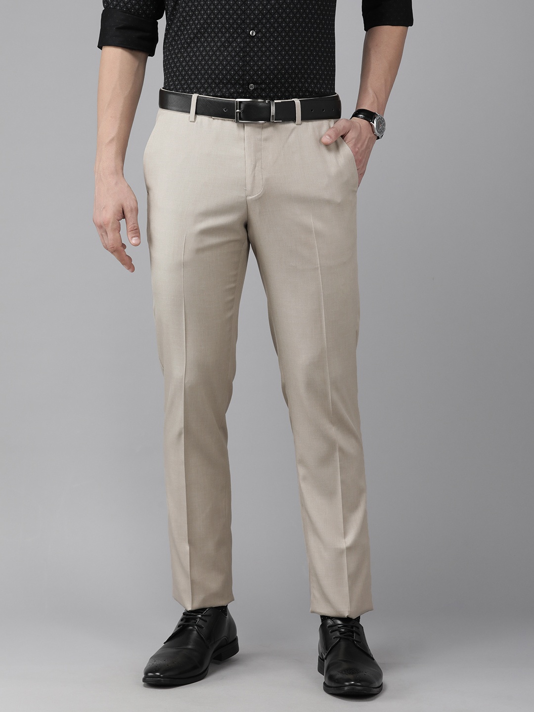 

Arrow Men Beige Solid Tailored Fit Formal Trousers