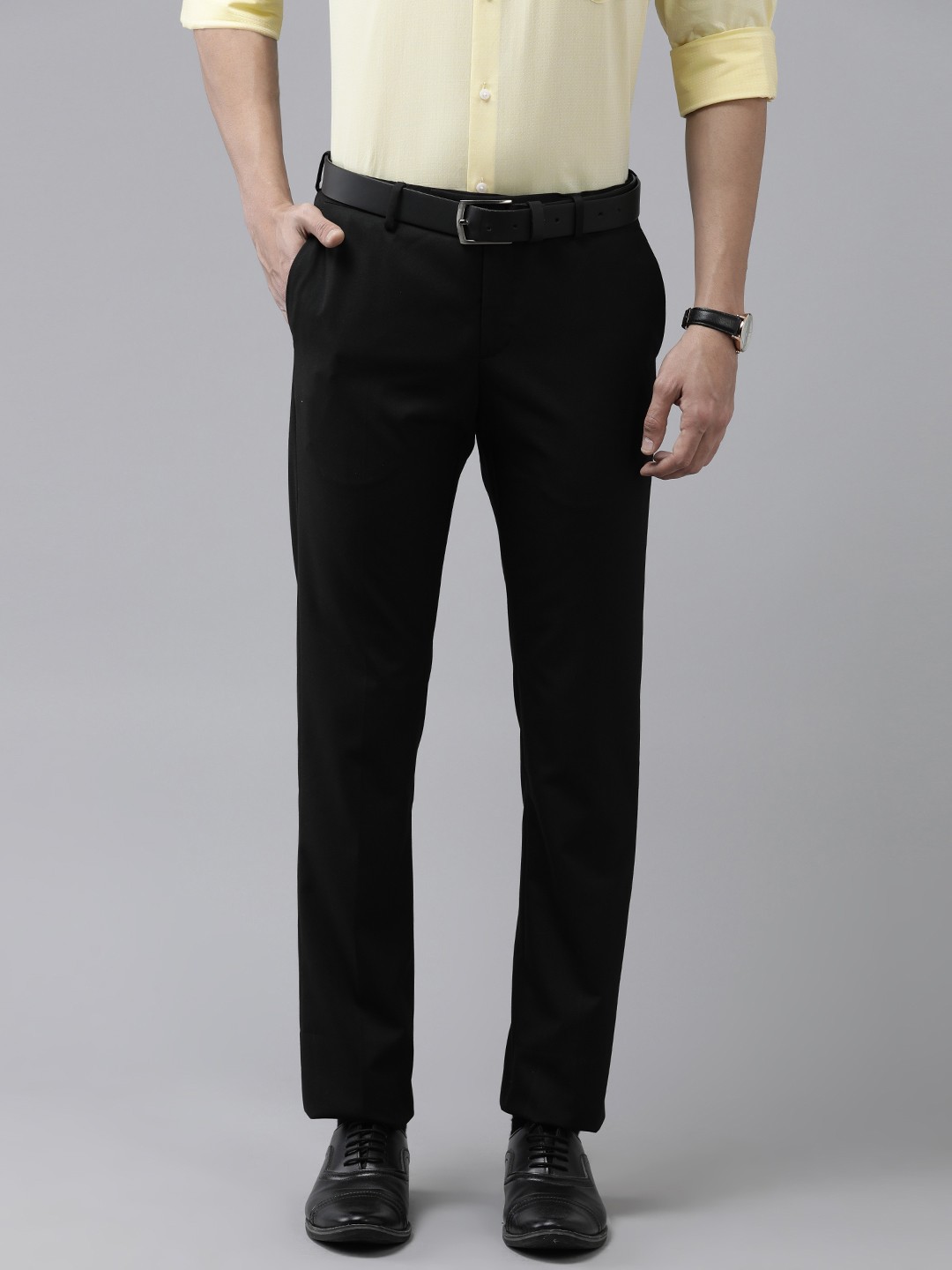 

Arrow Men Black Solid Tailored Fit Mid-Rise Plain Woven Flat-Front Formal Trousers