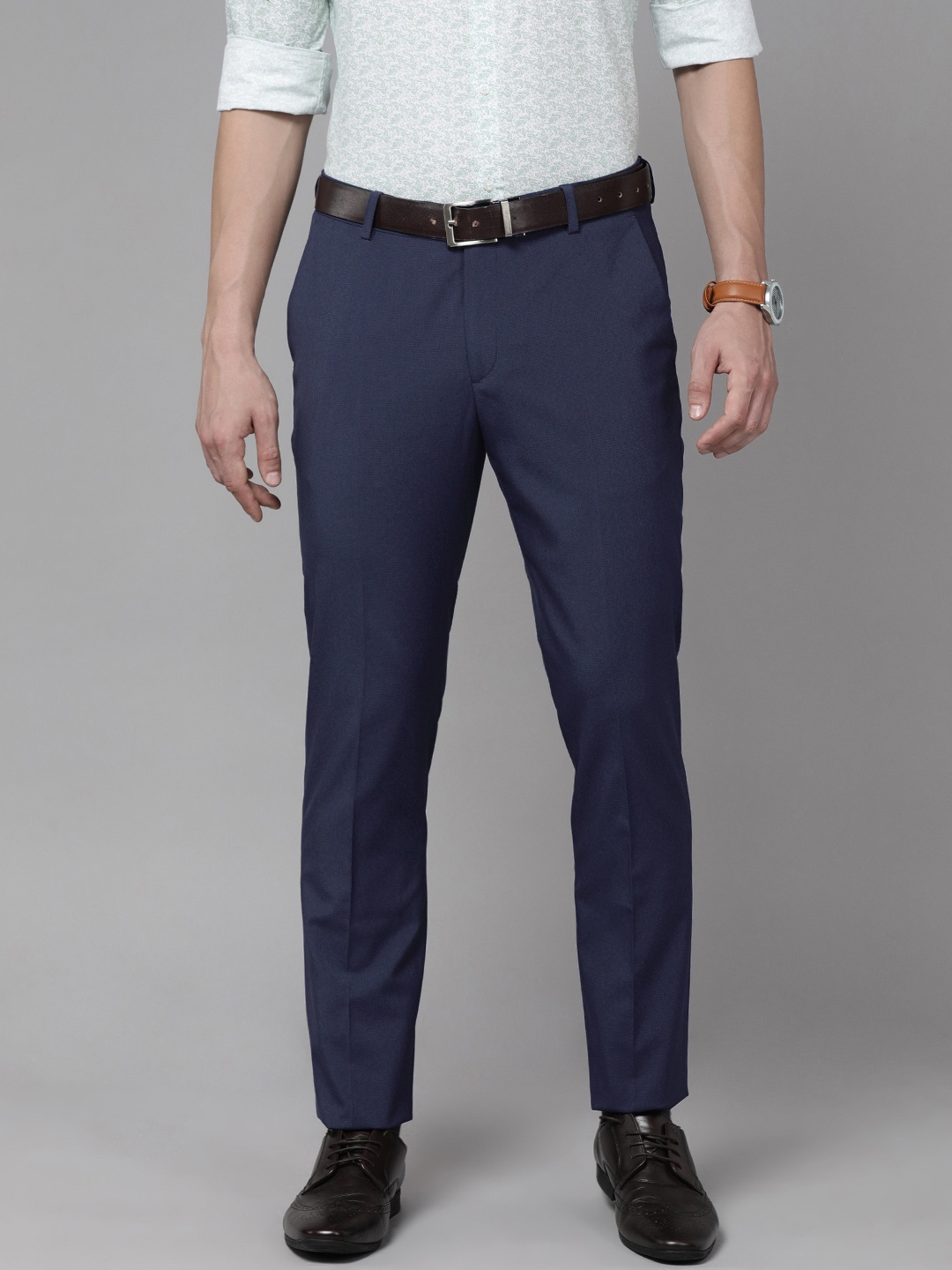 

Arrow Men Blue Solid Mid Rise Tailored Formal Trousers