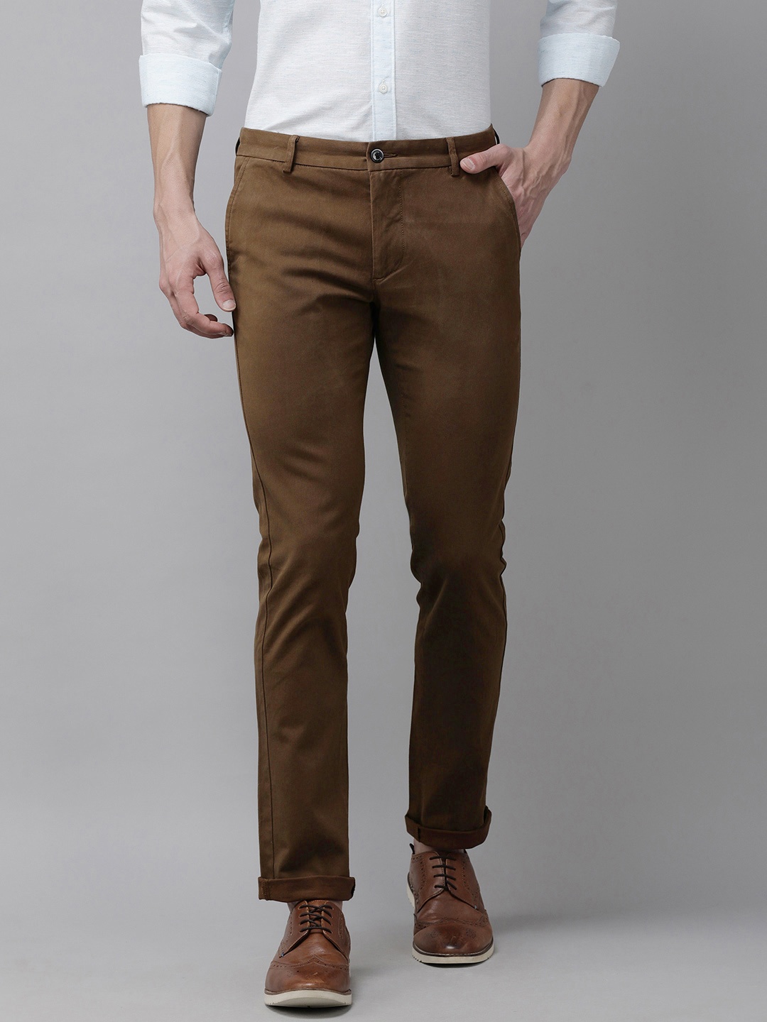 

Arrow Sport Men Brown Solid Original Slim Fit Mid-Rise Plain Woven Flat-Front Trousers