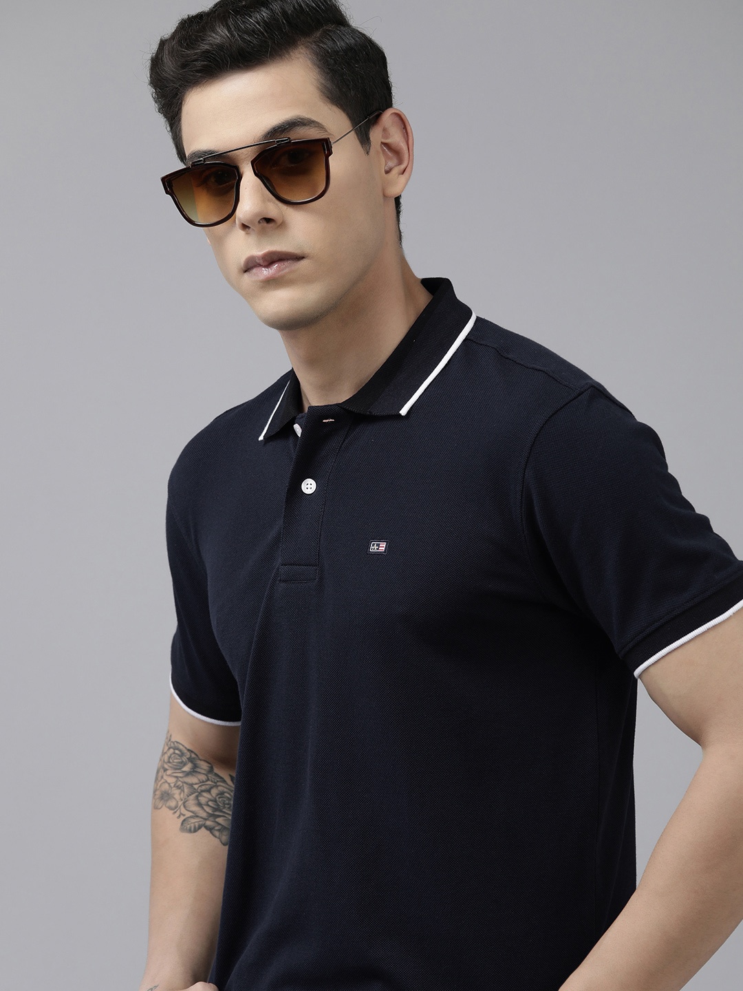 

Arrow Men Navy Blue Solid Polo Collar Indigo Brand Logo Applique Regular Fit T-shirt