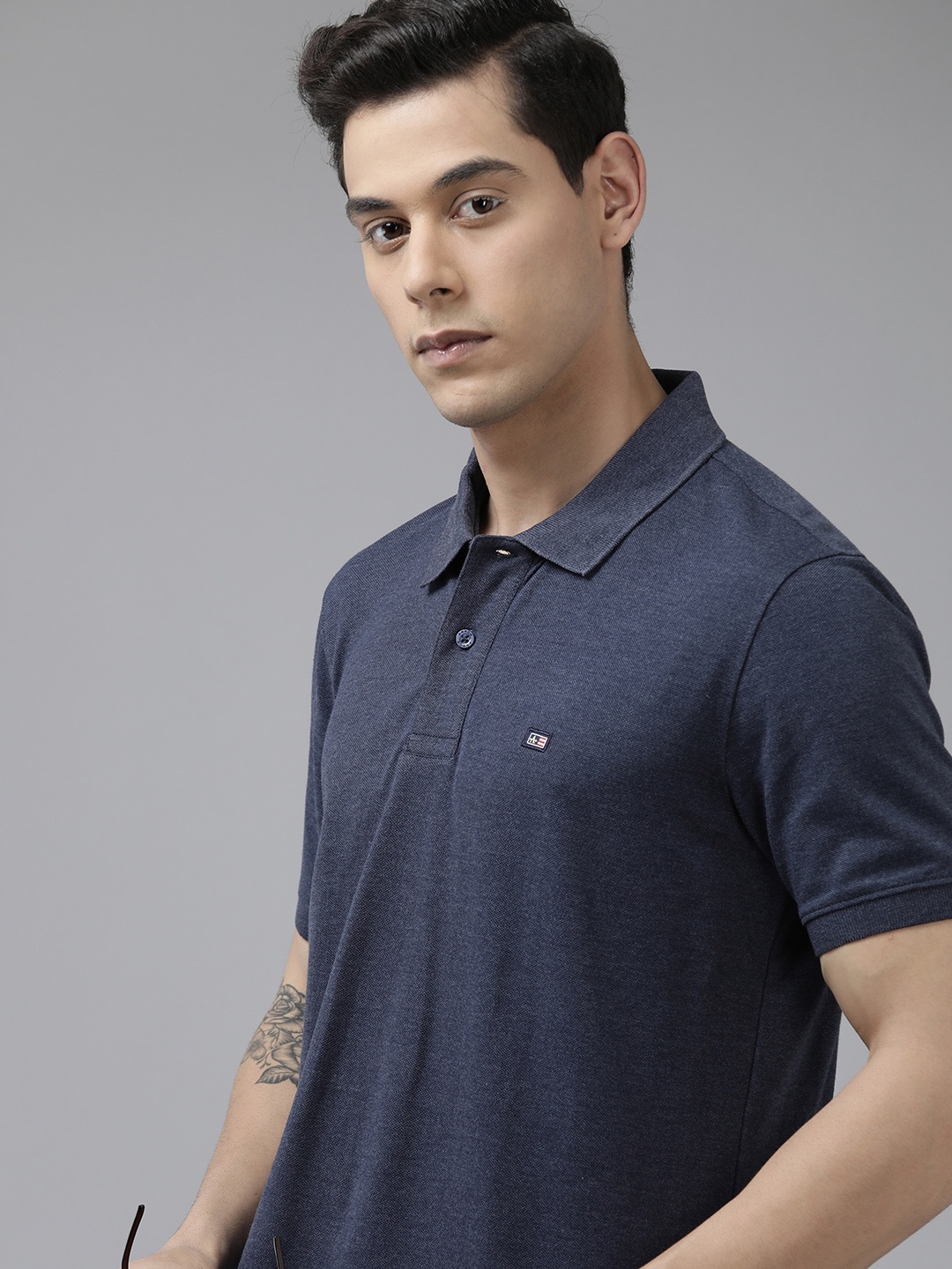 

Arrow Men Navy Blue Solid Polo Collar Indigo Brand Logo Applique Knitted T-shirt