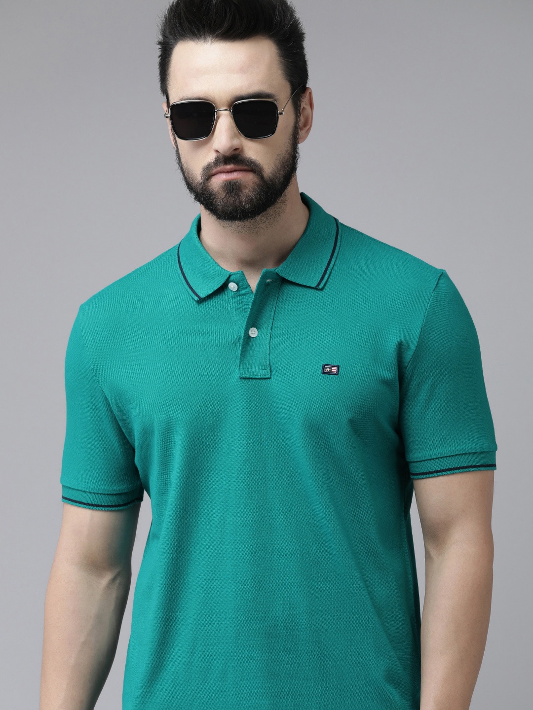 

Arrow Men Teal Polo Collar Pure Cotton T-shirt