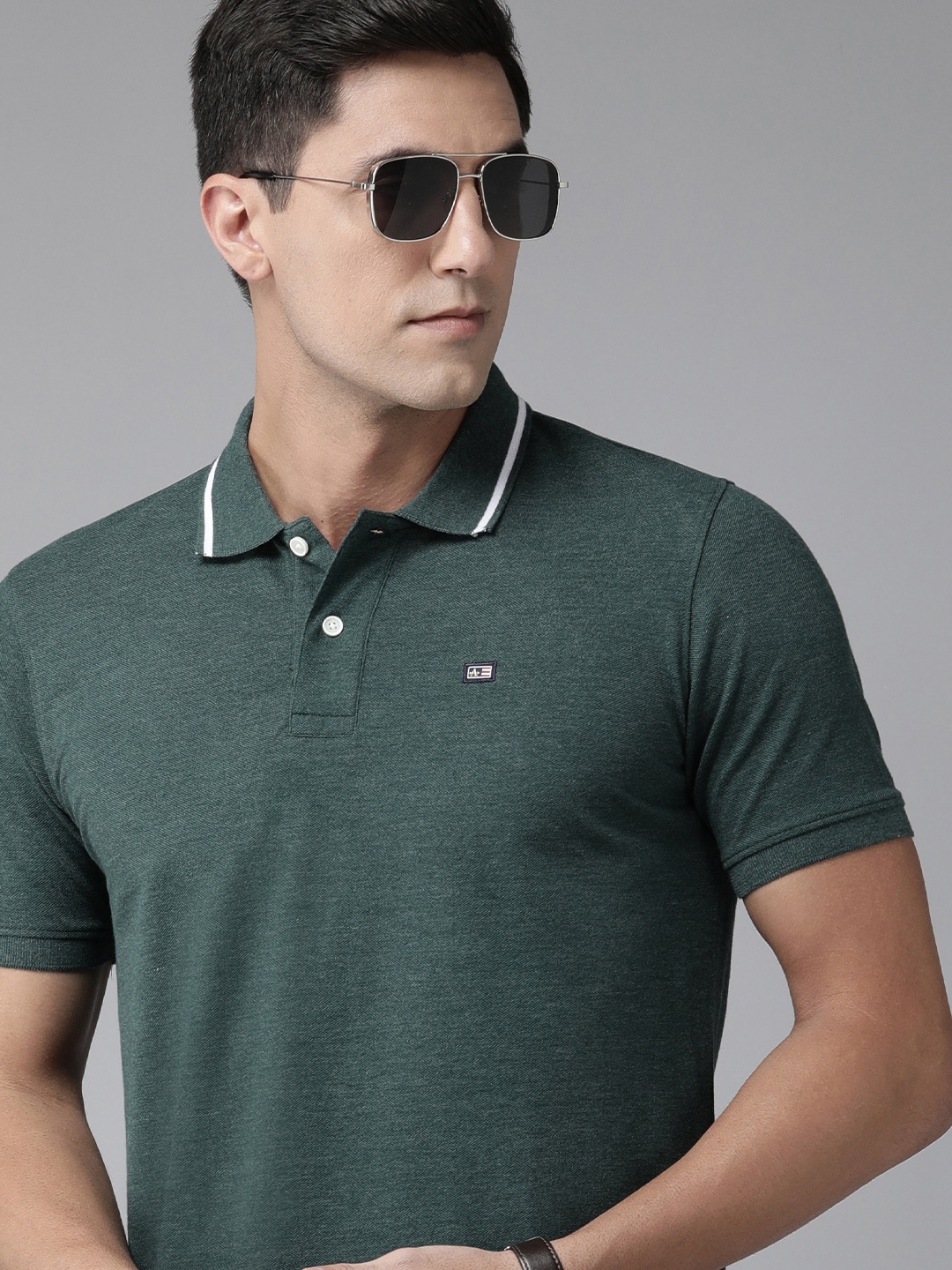 

Arrow Men Solid Polo Collar T-shirt, Green