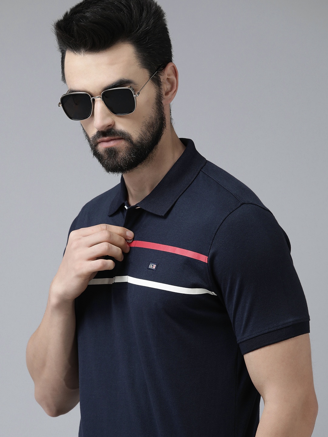 

Arrow Men Navy Blue Striped Polo Collar Pure Cotton T-shirt