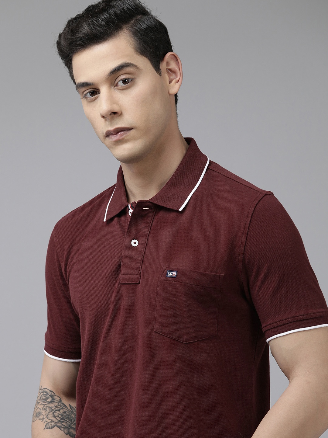 

Arrow Men Burgundy Solid Polo Collar Pockets Pure Cotton Regular Fit T-shirt
