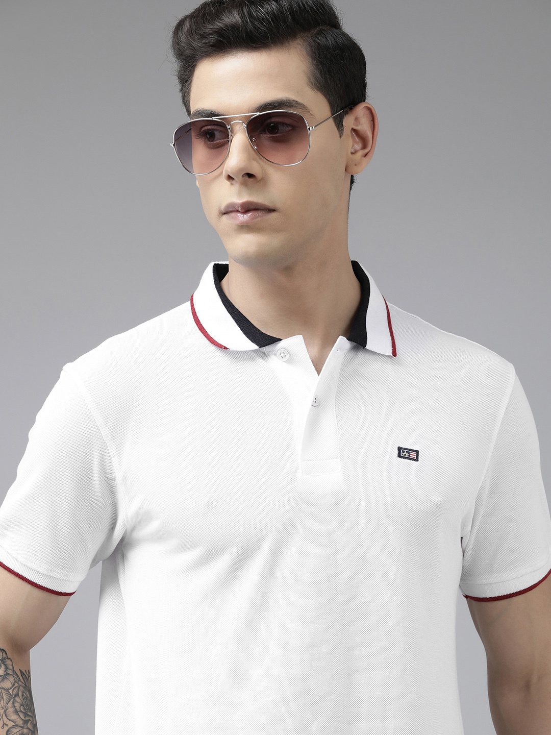 

Arrow Men White Solid Polo Collar Brand Logo Applique Regular Fit T-shirt