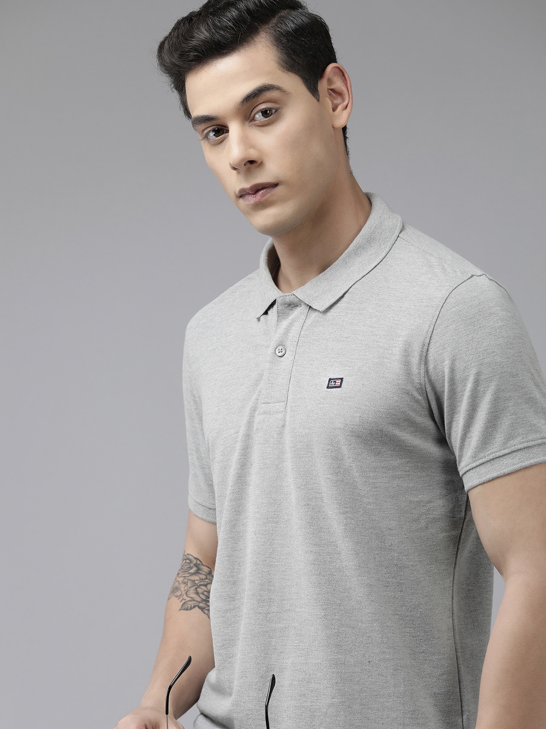 

Arrow Men Grey Melange Solid Polo Collar Brand Logo Applique Regular Fit T-shirt