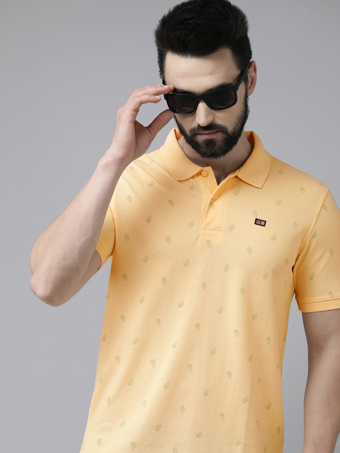 

Arrow Men Beige Printed Polo Collar T-shirt