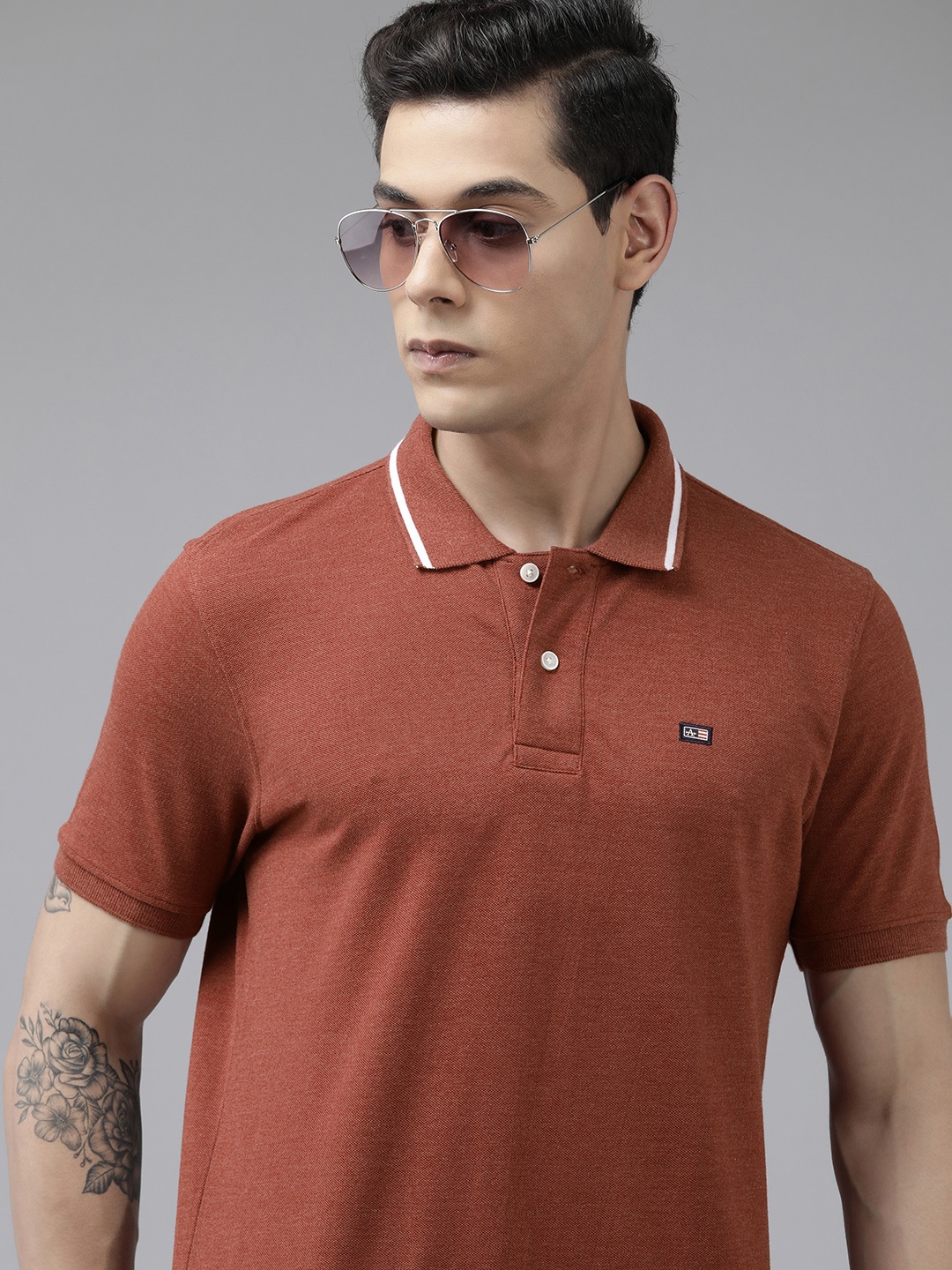 

Arrow Men Red Melange Solid Polo Collar Brand Logo Applique Regular Fit T-shirt