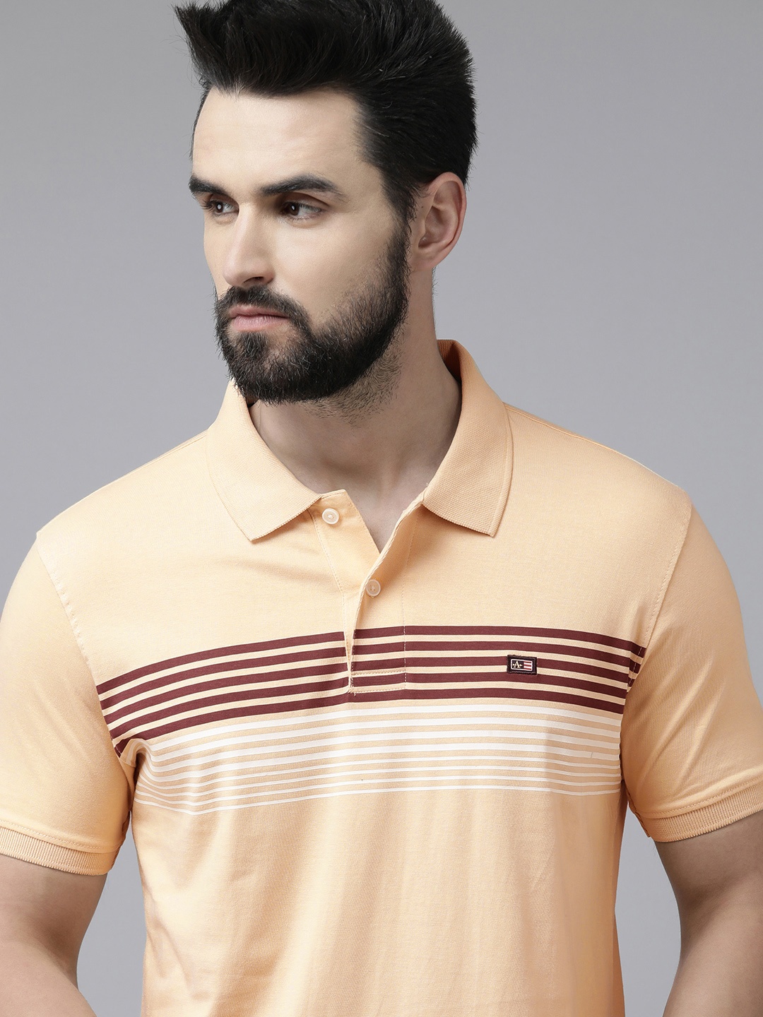 

Arrow Men Beige Printed Polo Collar Pure Cotton T-shirt