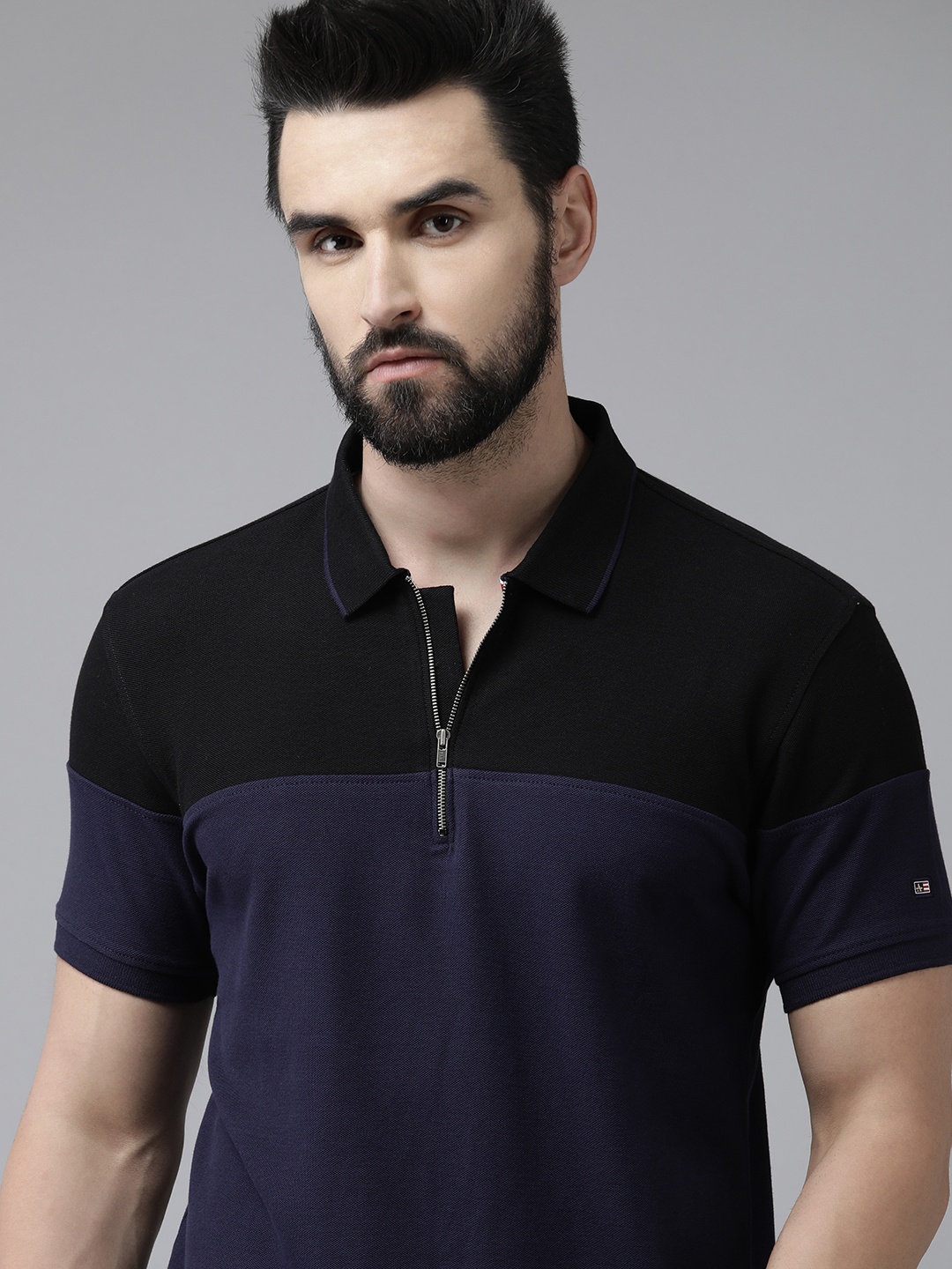 

Arrow Men Navy Blue Striped Polo Collar Pure Cotton T-shirt