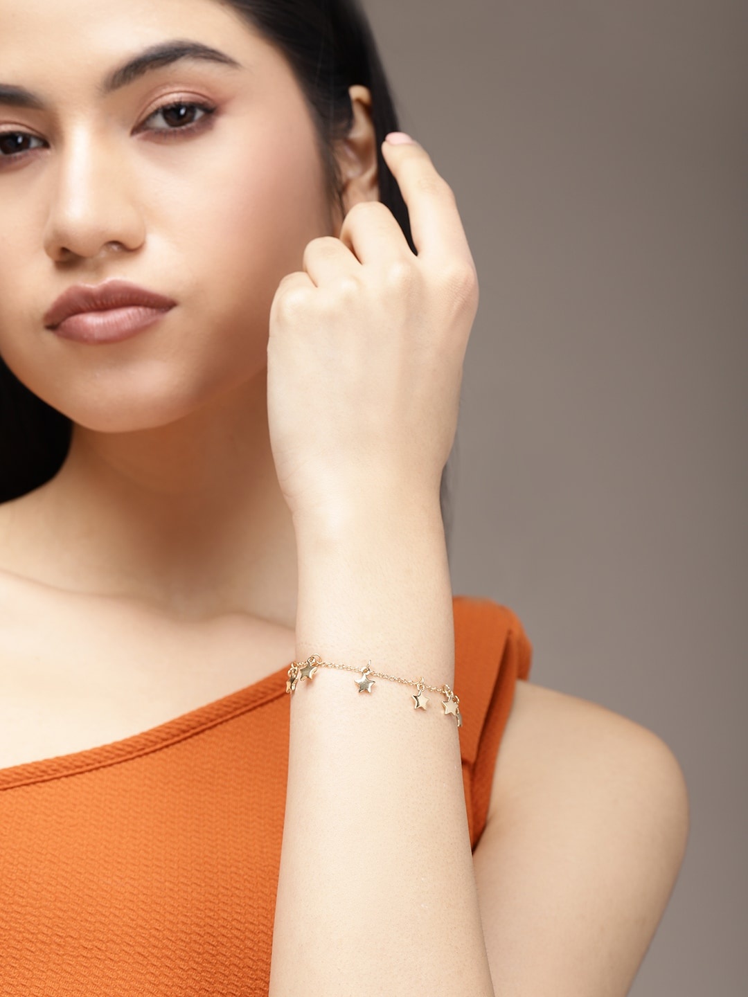 

bebe Women Gold-Toned Star Cast Charm Bracelet