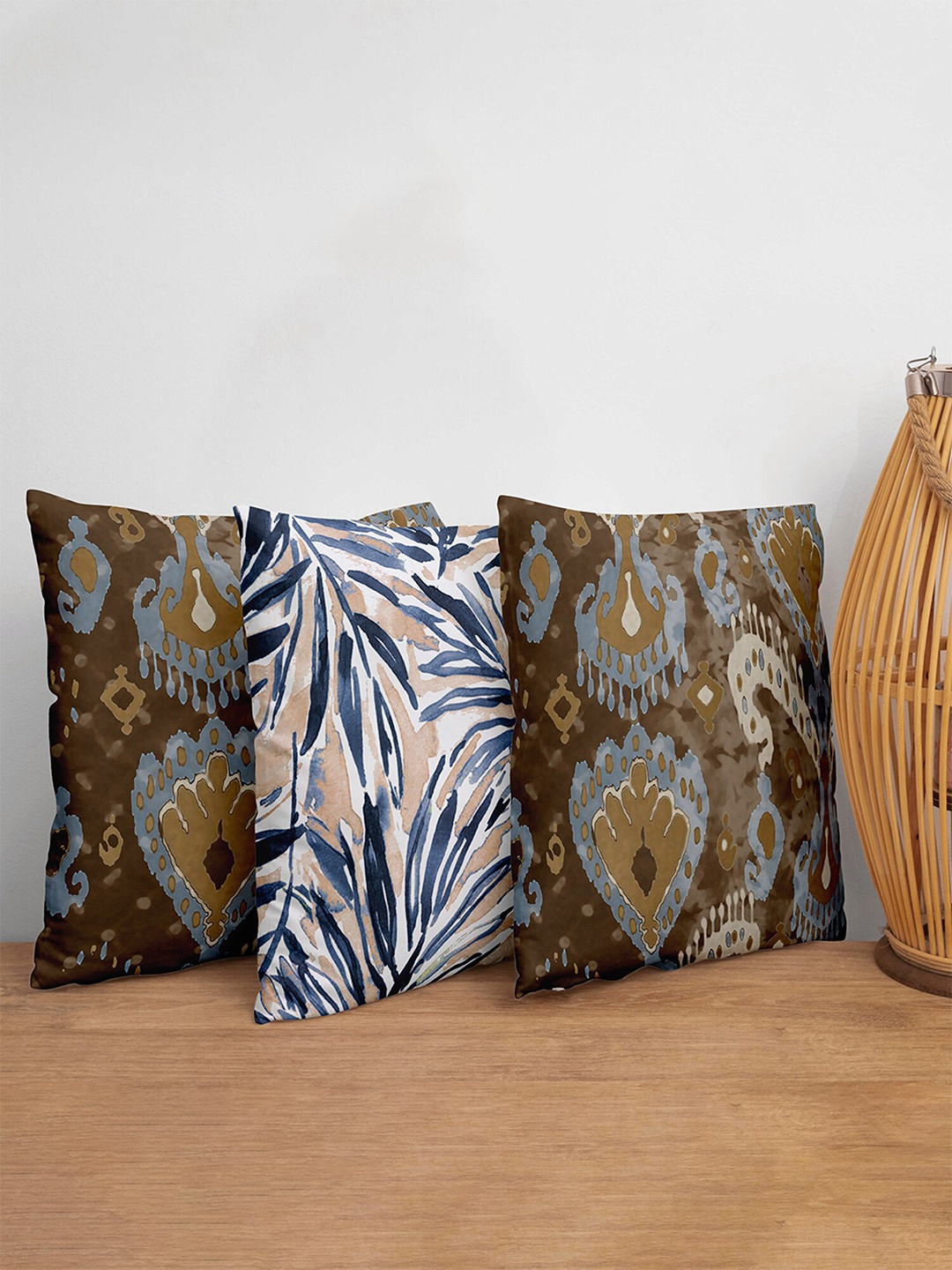 

ZEBA Brown & Blue Ikat Leaves Printed Set of 3 Square Cushion Covers