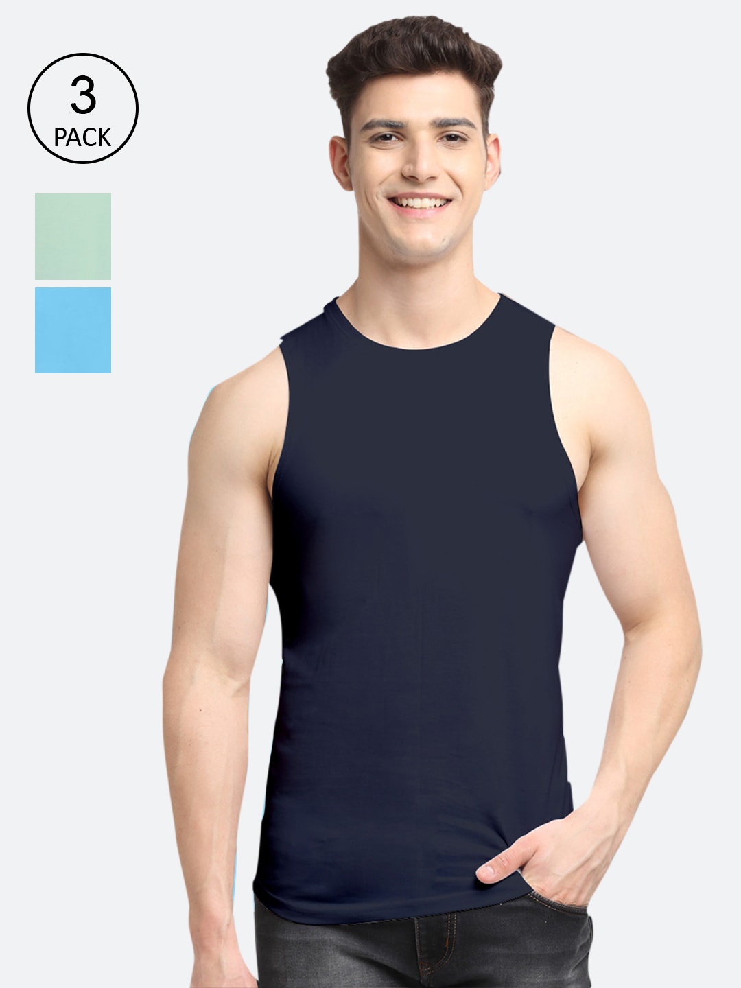 

Friskers Men Navy Blue and Green Pack Of 3 Solid Pure Cotton Innerwear Gym Vests