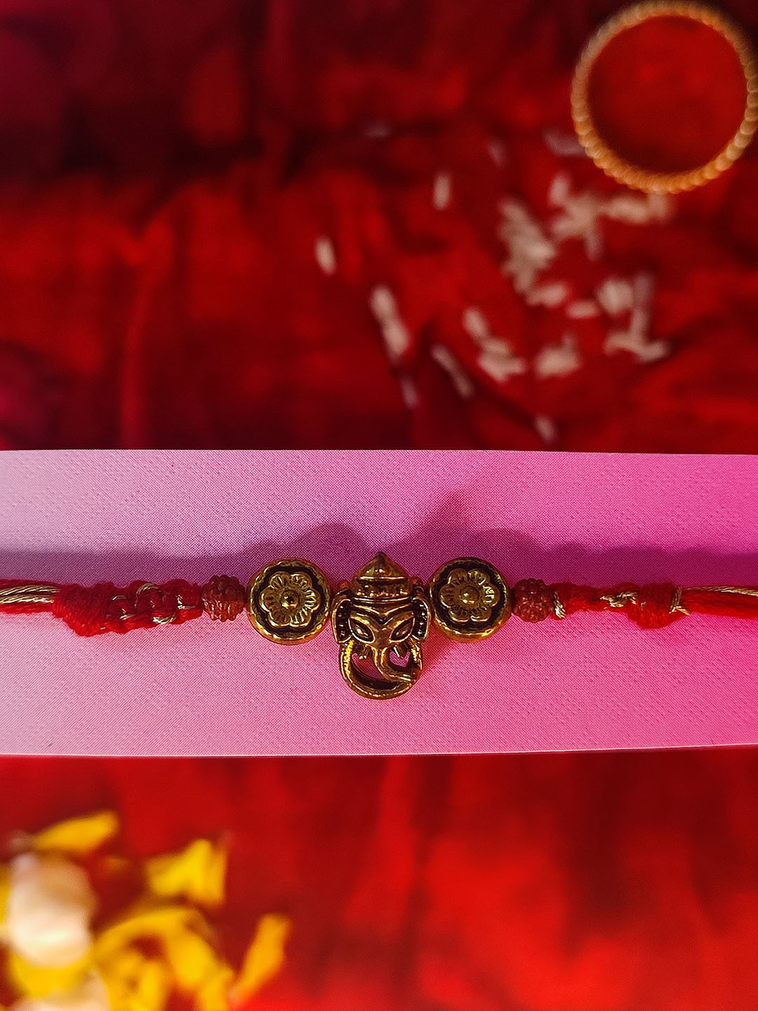 

CRAYTON Men Gold-Toned & Red Floral Ganpati Rakhi