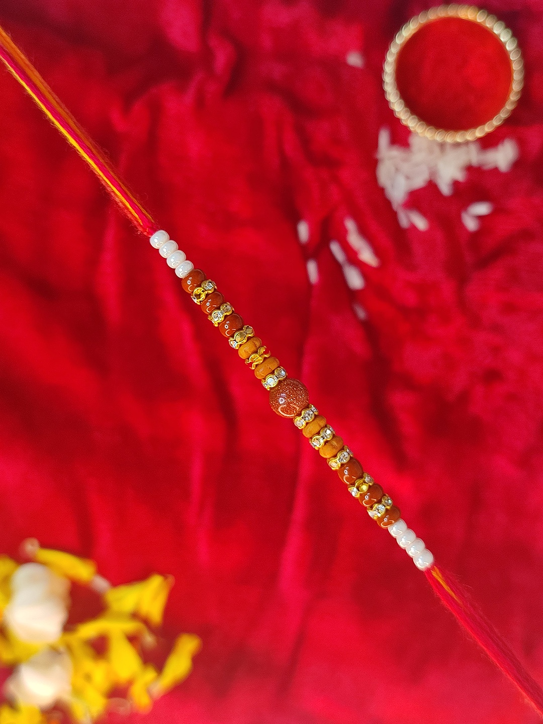 

CRAYTON Men Red Colured Beaded Thread Rakhi, Multi