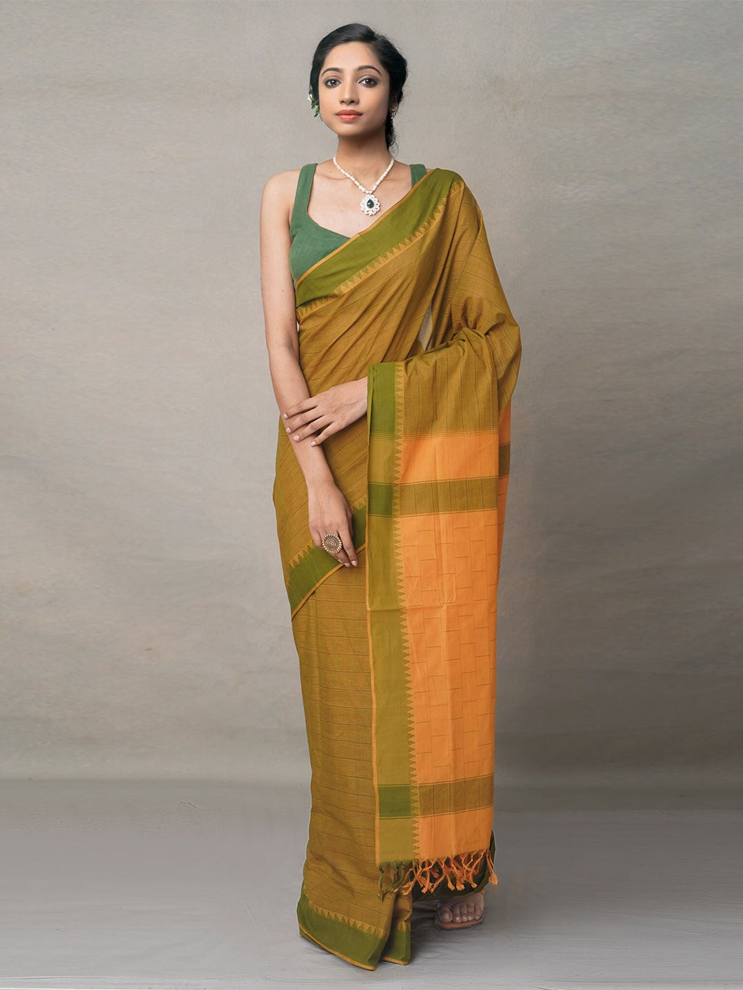 

Unnati Silks Green & Yellow Pure Cotton Chettinad Saree