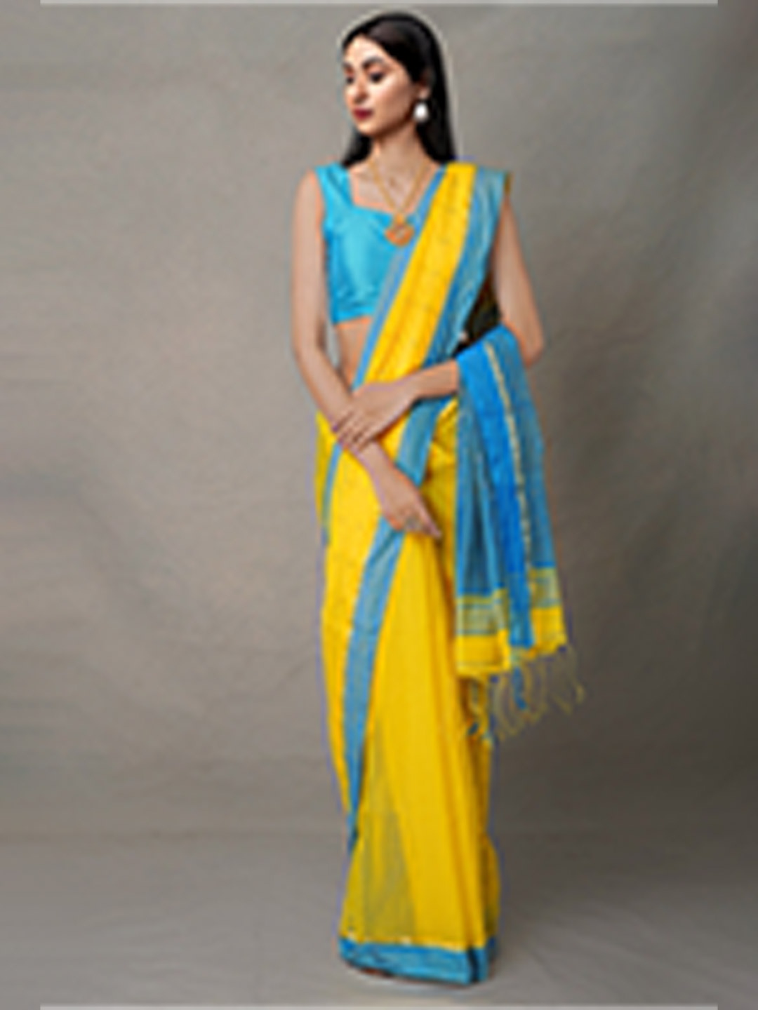 

Unnati Silks Yellow & Sea Green Woven Design Zari Linen Blend Jamdani Saree