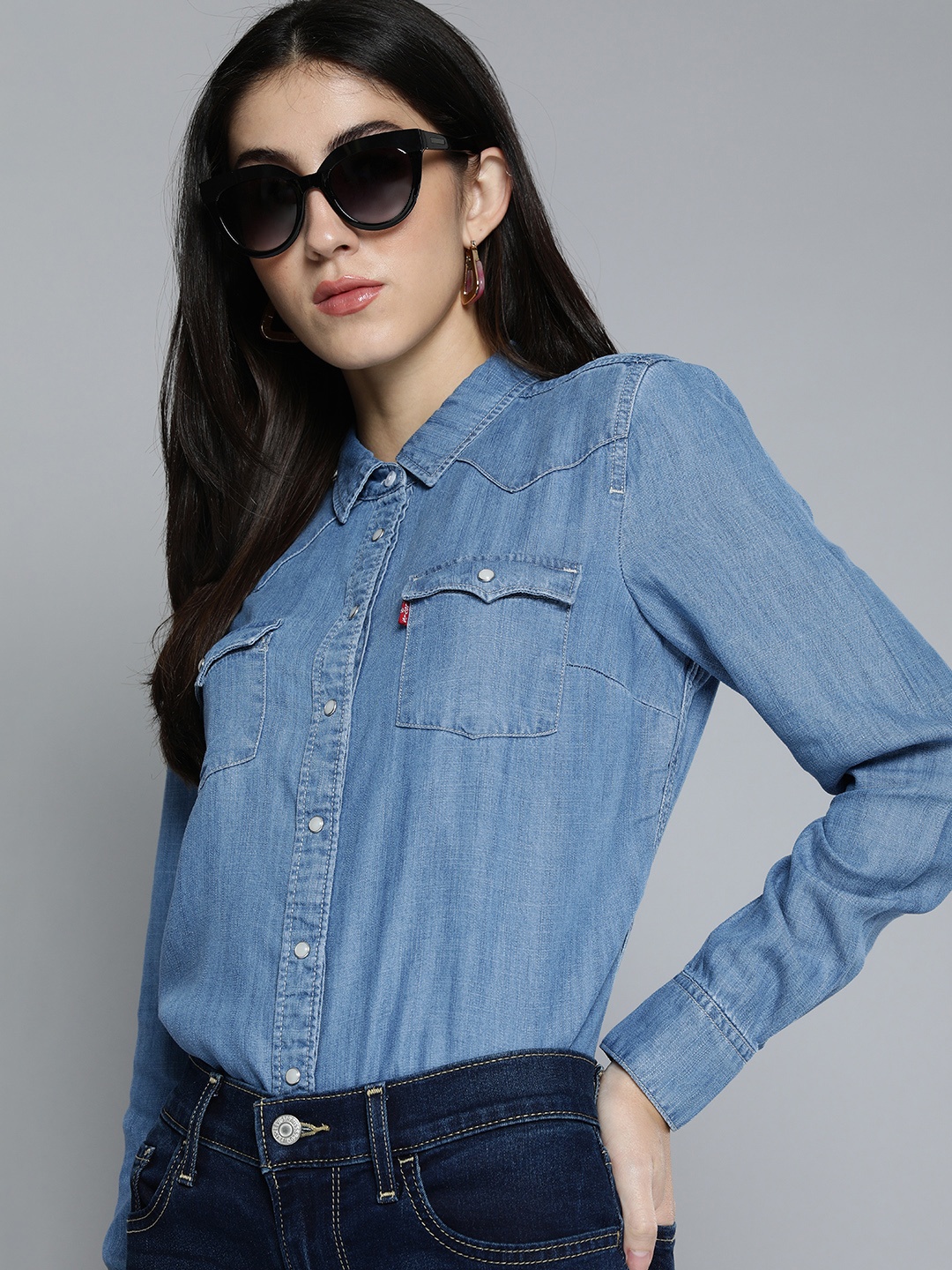 

Levis Women Blue Solid Regular Fit Casual Shirt With Chest Pockets