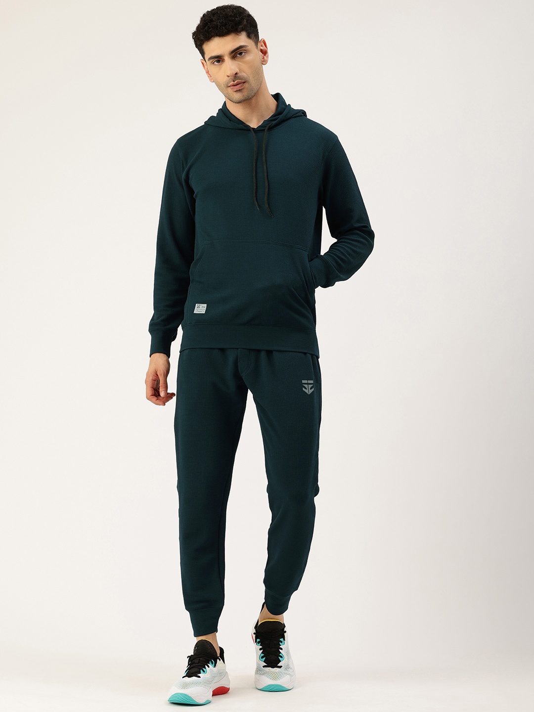 

Sports52 wear Men Self Design Textured Training Tracksuits, Teal
