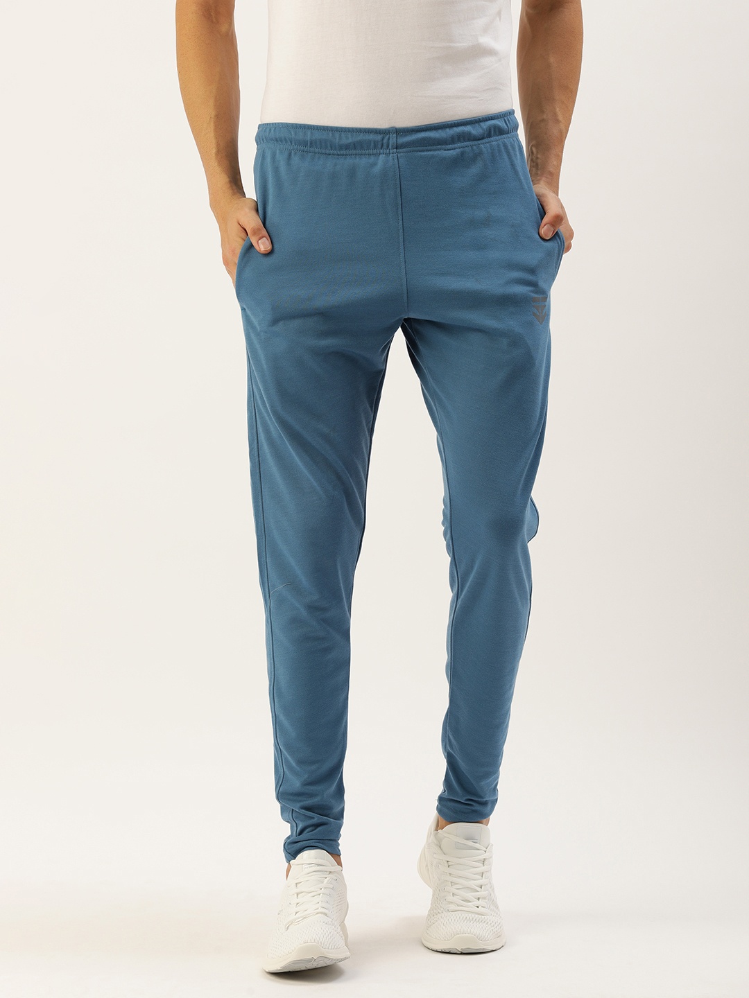 

Sports52 wear Men Beige Solid Mid Rise Regular Track pants, Blue