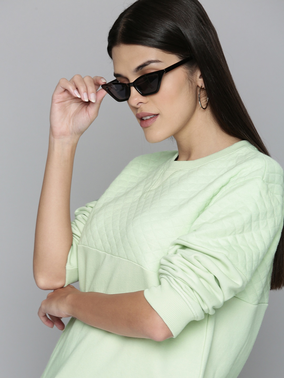 

Levis Women Mint Green Solid Quilted Sweatshirt
