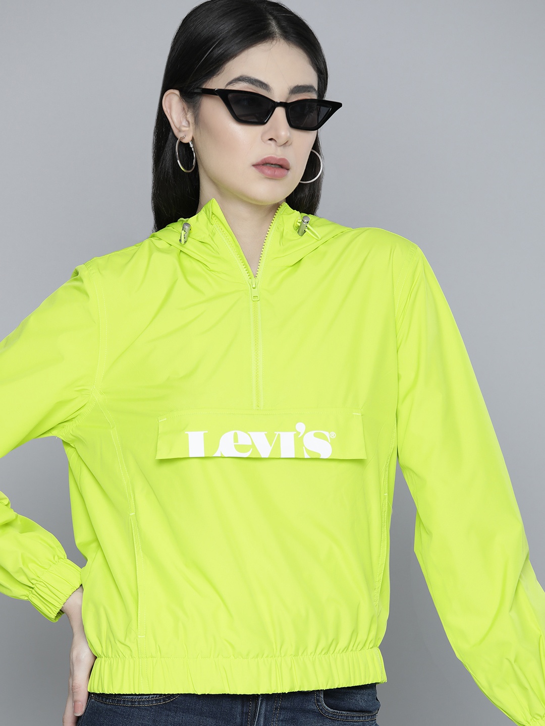 

Levis Women Fluorescent Green Solid Hooded Sweatshirt