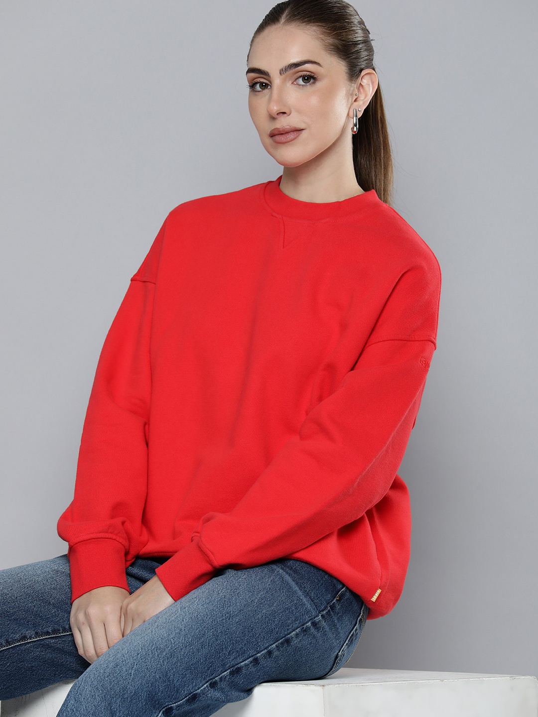 

Levis Gold Tab Women Solid Round Neck Knitted Pure Cotton Sweatshirt, Red